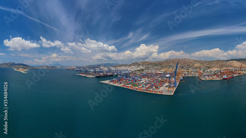 Aerial drone panoramic photo of industrial loading/unloading logistics container area of Perama, Piraeus port, Attica, Greece