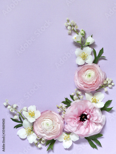floral background gentle lilac  wreath of pink pink  lily of the valley and jasmine. Romantic background for wedding invitations and greeting cards. place for text. copy space. Flatlay