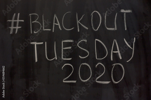 hashtag Blackout Tuesday 2020 on the blackboard background