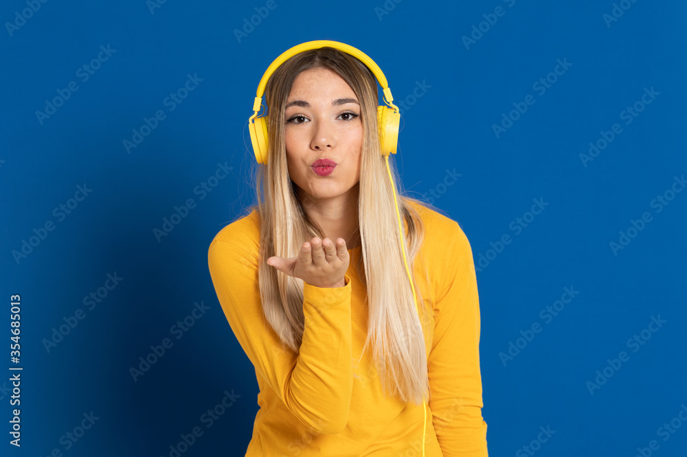 Blonde girl yellow headphones Blonde girl yellow headphones