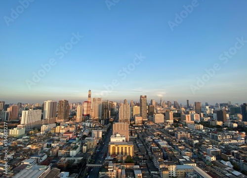 View of buildings , skyscrapers in the town with blue sky in the background. © Pom