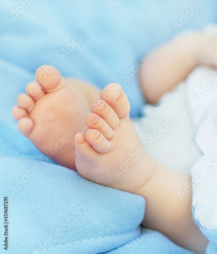 Close-up Newborn baby's feet on blanket