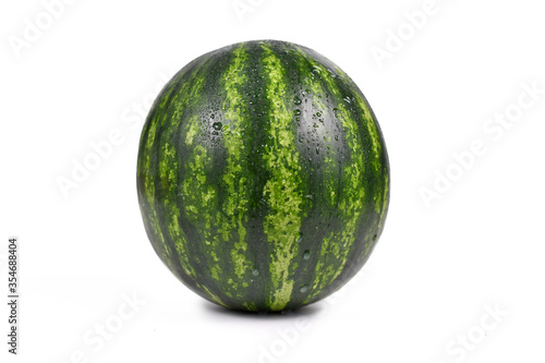 Whole round watermelon isolated on white background