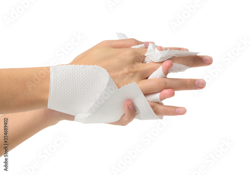 Woman drying hands with paper- Isolated on white background