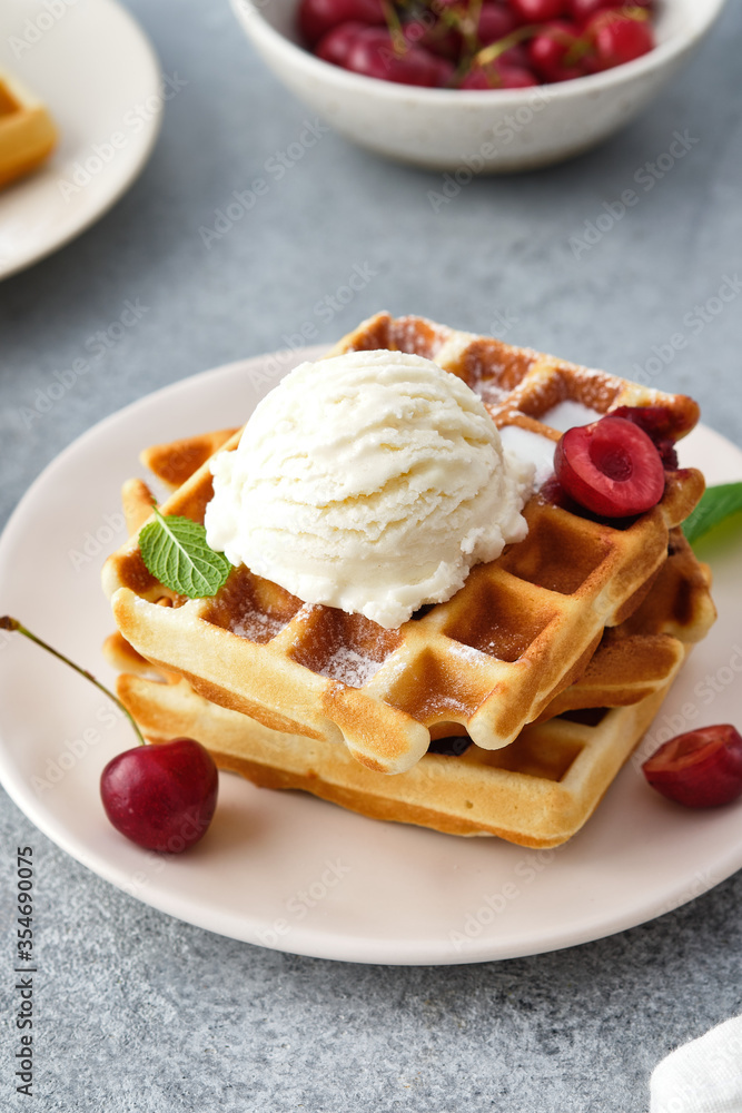 Baked traditional Belgium waffles with ice cream and cherries. Breakfast. Baked traditional Belgium waffles with ice cream and cherries. Breakfast.