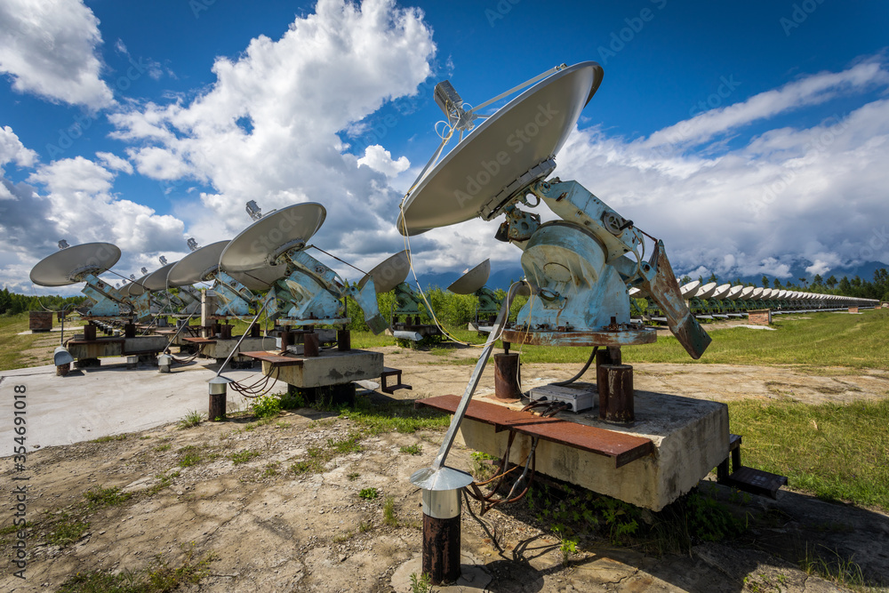 satellite dishes on a background of mountains
badars