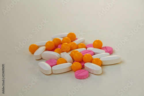 pills and tablets on white background