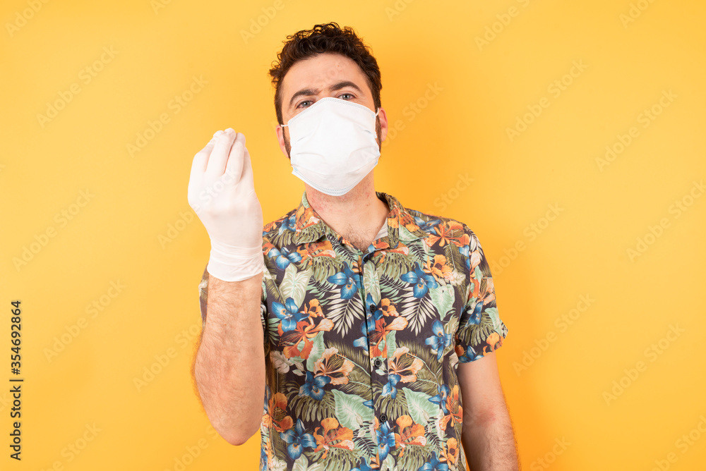 What the hell are you talking about. Shot of frustrated young european man gesturing with raised hand doing Italian gesture, frowning, being displeased and confused with dumb question. Hawaiian shirt What the hell are you talking about. Shot of frustrated young european man gesturing with raised hand doing Italian gesture, frowning, being displeased and confused with dumb question. Hawaiian shirt