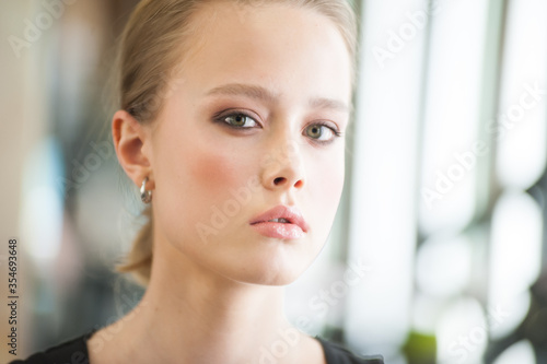 Young blonde woman beauty portrait