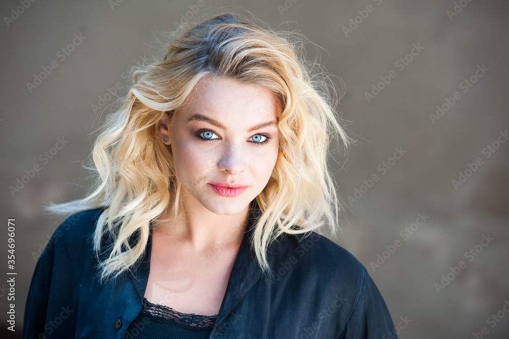 Fototapeta premium Perfect blonde woman with professional make up and hair
