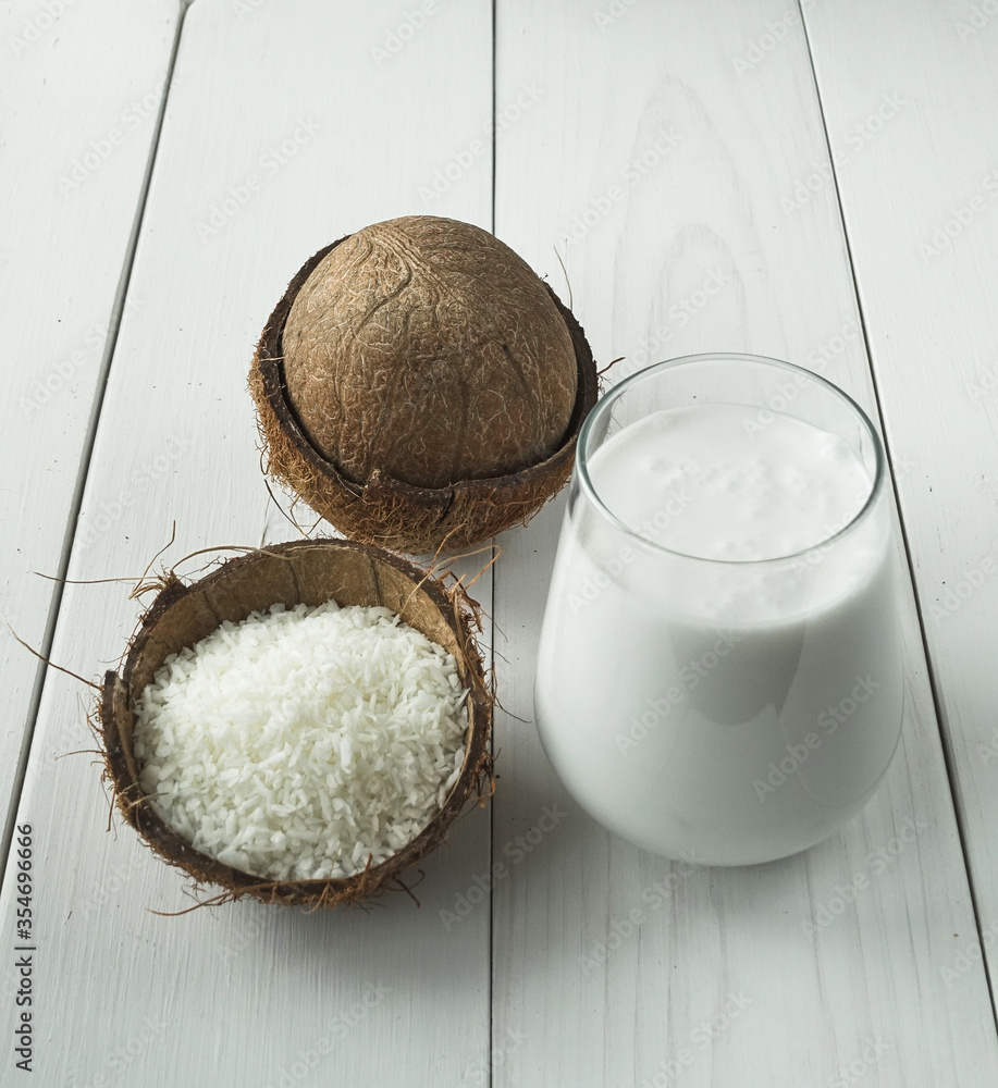 glass of coco milk, flakes and coconut glass of coco milk, flakes and coconut