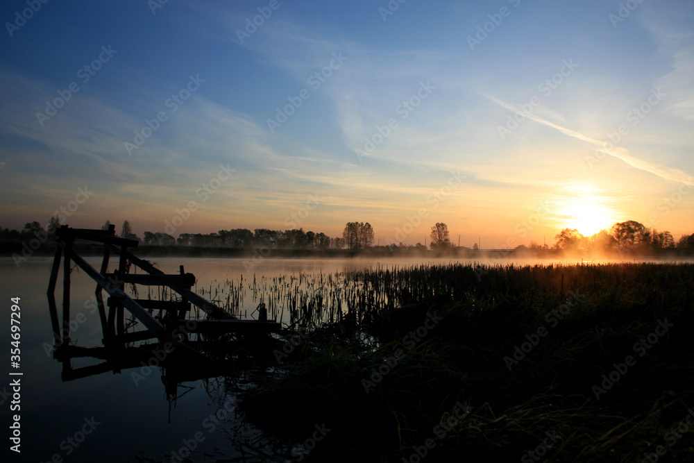 Sunrise on the Biebrza river in Biebrza National Park, Poland