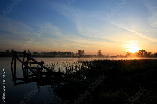 Sunrise on the Biebrza river in Biebrza National Park, Poland © bayazed