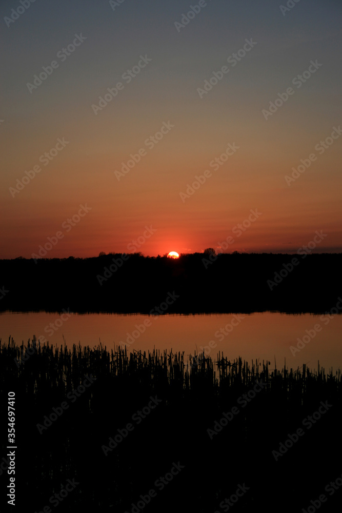 Sunset on the Biebrza river in Biebrza National Park, Poland
