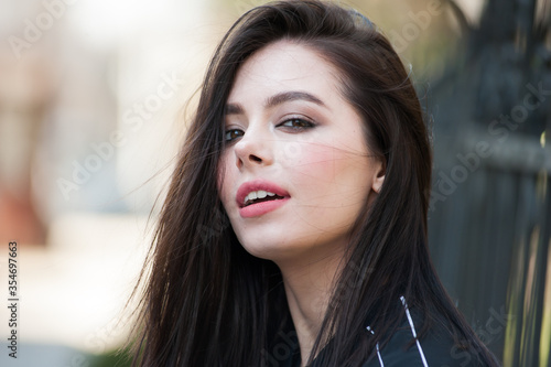 Portrait of beautiful young woman with makeup 