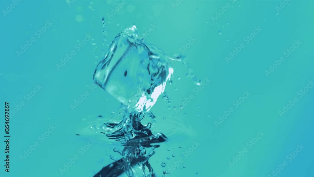 Ice Cube Water Falling in Slow Motion With An Isolated Ice Cube Ice Cube Water Falling in Slow Motion With An Isolated Ice Cube