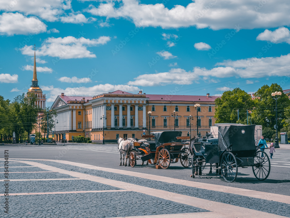 View Winter Palace square with carriage and horses in Saint Petersburg. Russia