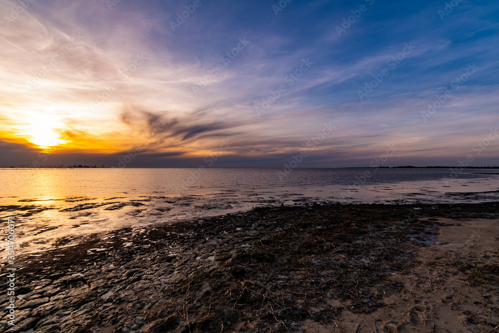 Sunset on the North Sea beach in East Frisia in early summer