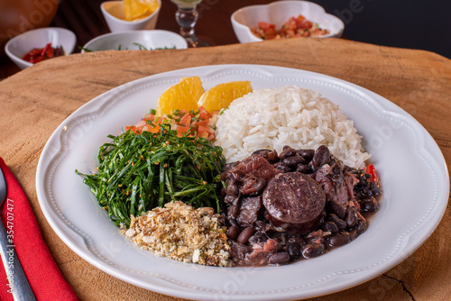 Foto Typical Brazilian dish called Feijoada