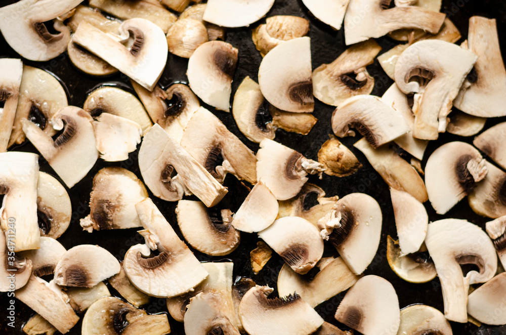 Cook at home. Roasting mushrooms in a pan. Vegetarian protein food Cook at home. Roasting mushrooms in a pan. Vegetarian protein food