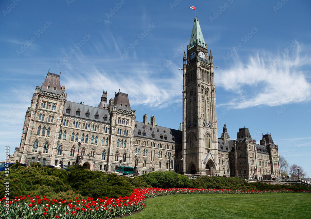 Canadian Parliament Centre Block With Peace Tower During The Springtime Tulip Festival