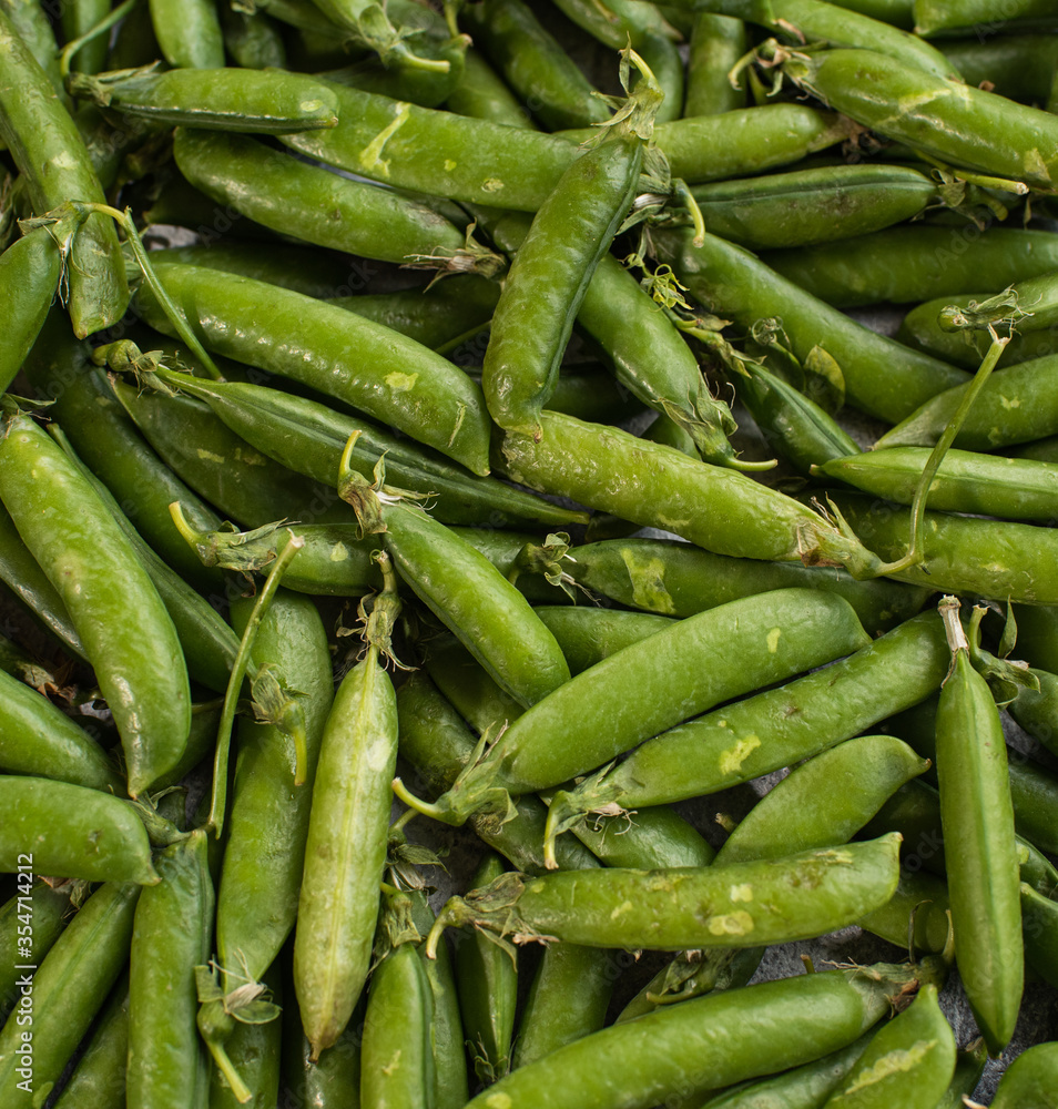 A lot of fresh and tasty green peas. Healthy food A lot of fresh and tasty green peas. Healthy food