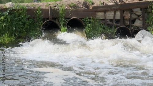 Draining water through pipes into a sump to purify water from harmful impurities in slow motion video