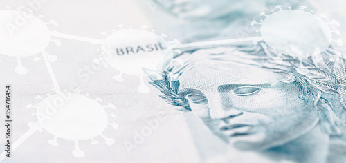 details of 100 reais banknote from brazil, with selective focus,