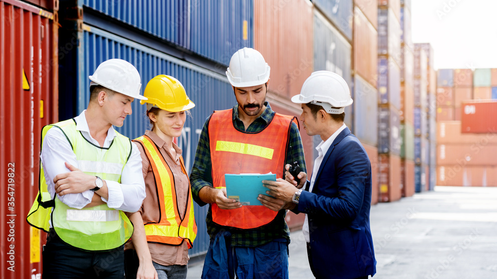 Team Construction or engineering group and worker. Teamwork and determination to succeed. Safety hard hat to prevent accident while working Transport and Container Team. Concept Restart and new Normal Team Construction or engineering group and worker. Teamwork and determination to succeed. Safety hard hat to prevent accident while working Transport and Container Team. Concept Restart and new Normal