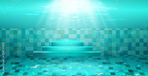 Swimming pool with blue water  ripples and highlights. Texture of water surface and tiled bottom. Overhead view. Summer background.
