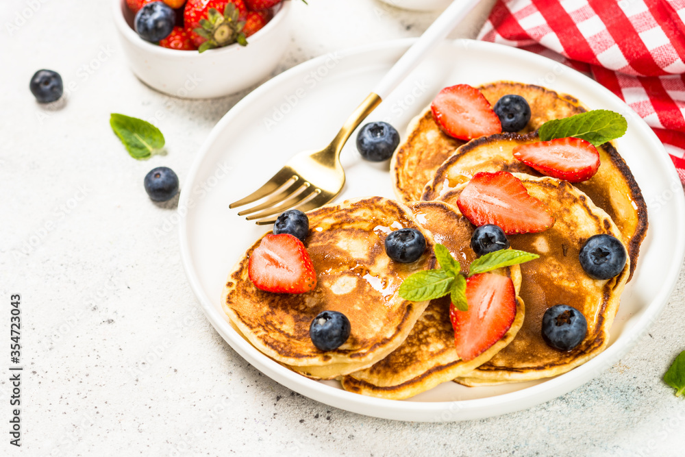 Pancakes with fresh berries and honey. Pancakes with fresh berries and honey.