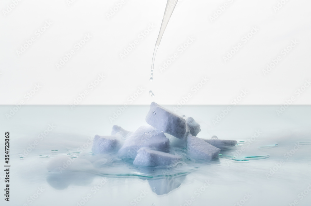 Experiment with dry ice. Pour water on dry ice. Sublimation. Steam in