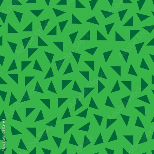 Triangle background. Seamless pattern. Geometric abstract texture. Green colors. Polygonal mosaic style. Vector illustration