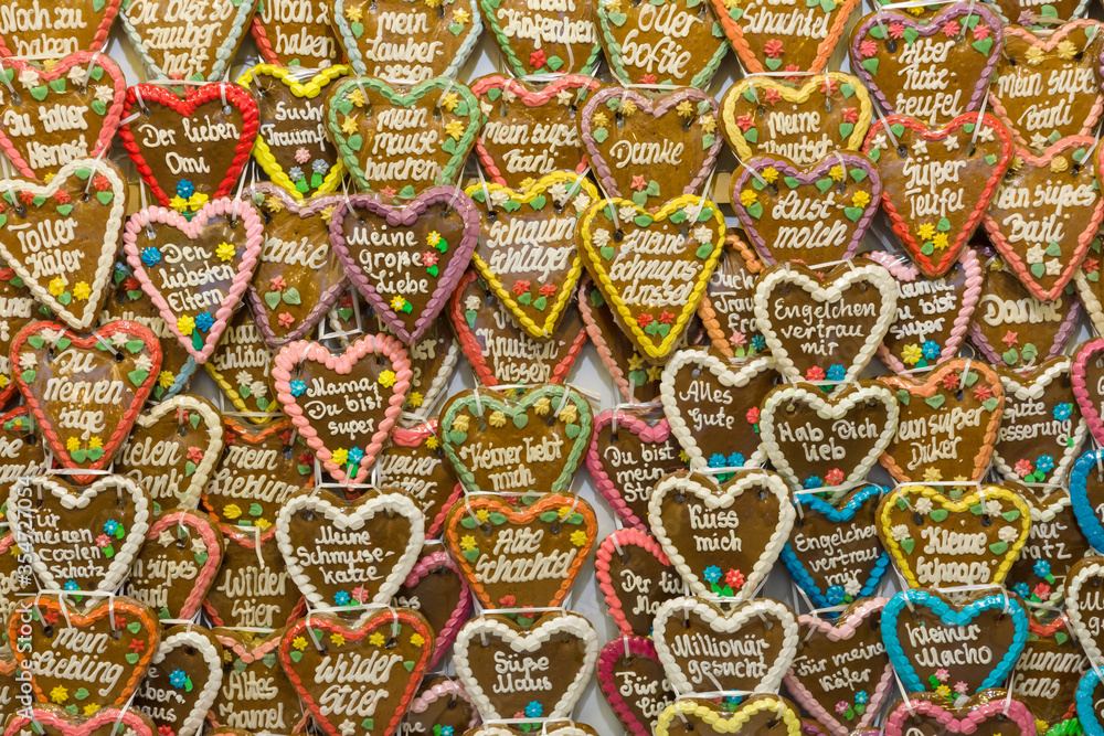 Christmas market in the old town of Potsdam. Germany. Traditional gingerbread in form of heart (Lebkuchen). Background.