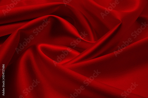 Red satin or silk fabric as background