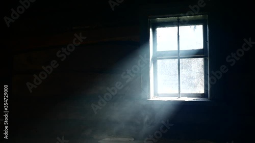 Smoke in a ray. Light falling from a window.