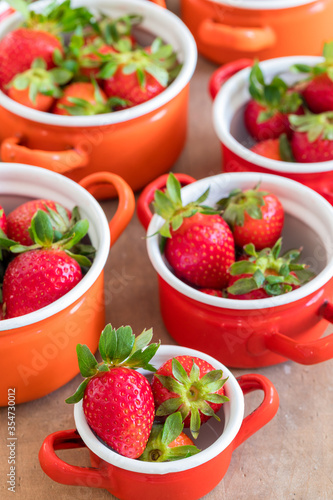 Freshly picked strawberries in pots