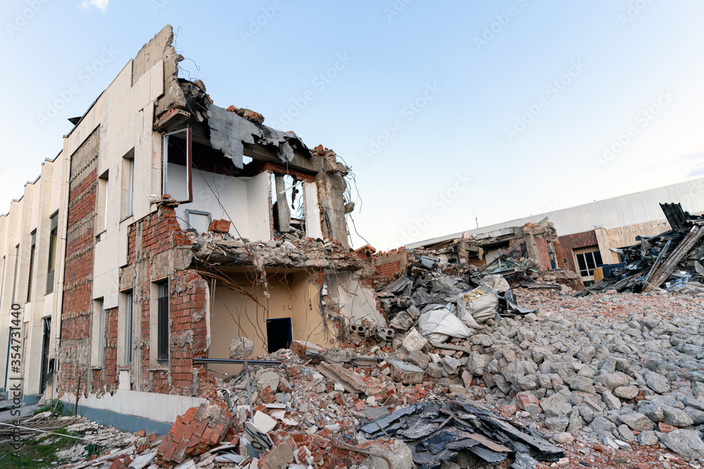 Demolished building. Ruined build structure. Construction Industry