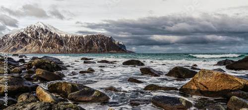 Magnificent winter mountain landscape on the sea.  Vareid beach, Lofoten islands, Norway. © FoodAndPhoto