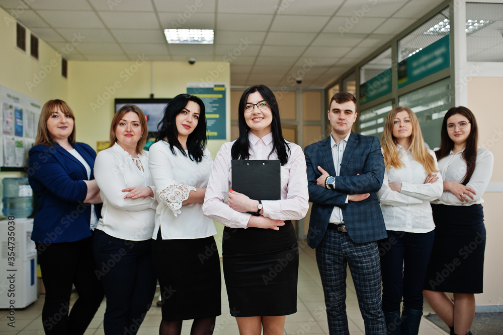 Portrait of young business people group of bank workers in modern office. Portrait of young business people group of bank workers in modern office.