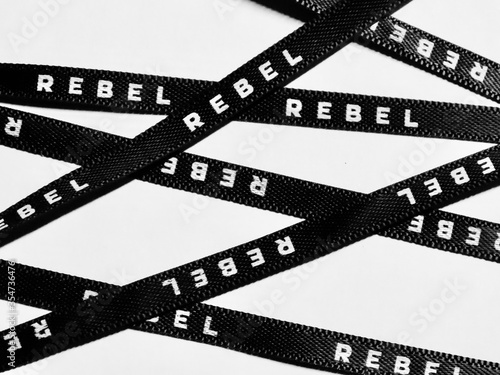 Obraz na plátně Black ribbon 'Rebel'
