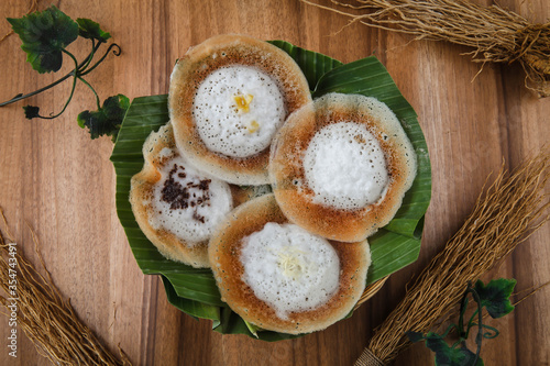 фотографія Serabi Solo is Pancake a snack food with soft texture on solo pancake obtained from the basic ingredients in the form of rice flour