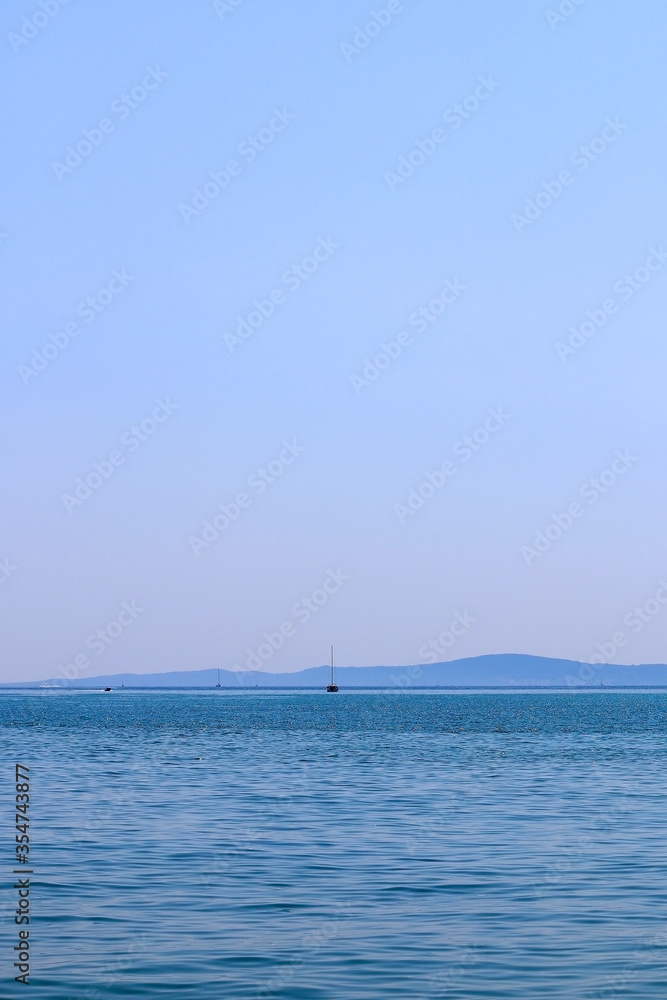 Sailing boat in Dalmatia region, Croatia during sunny summer day. 