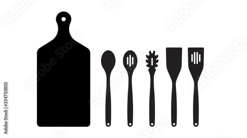 KITCHEN UTENSILS: baking spatula, skimmer spoon, scraper, serving and spaghetti spoon, vegetable wood spoon, spatula, cutting board. Wooden kitchen accessories.