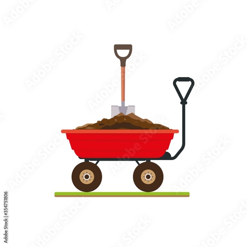 Wheelbarrow with pile of soil and a shovel. Utility wagon with dirt. Gardening equipment.