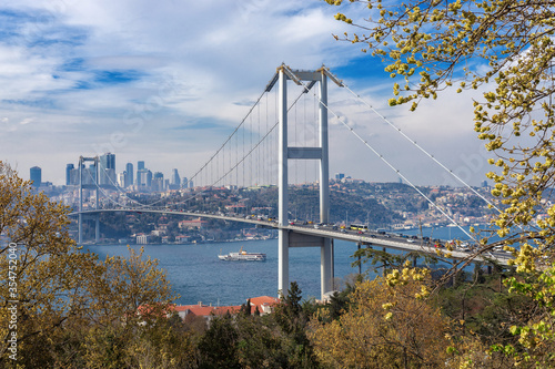 Kuzguncuk, Uskudar - April 07, 2019 : Bosphorus Bridge. (15th July Martyrs Bridge) General view of the Anatolian side and the European. Istanbul - TURKEY © AYDIN