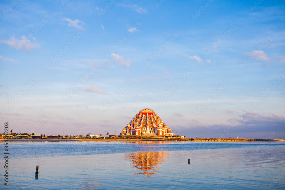 Obraz premium Masjid 99 Kubah (99 Domes Mosque), a beautiful Mosque with unique architecture, located in famous destination, Losari Beach, Makassar, South Sulawesi, Indonesia. A new Landmark of Makassar City.