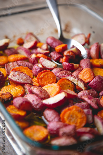 Healthy baked radishes and carrots