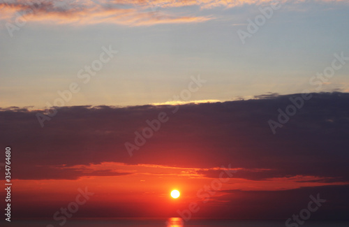 Beautiful sunset in Black sea of Georgia, Horizon and colorful sky. © taidundua