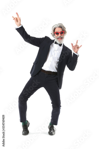 Cool senior man dancing aga...